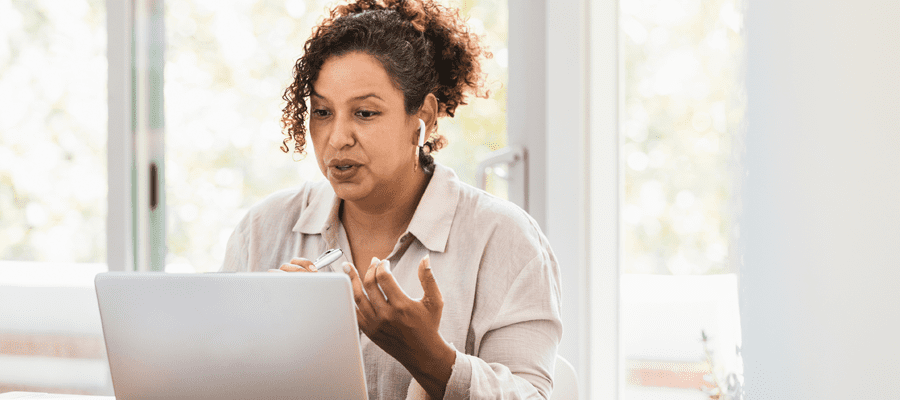 Woman engaged in a video call conversation.